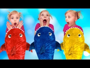 Alisa has fun with Baby Shark toy