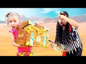 Little girl and dad are looking for Pirate treasure