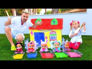 Little girl and Dad coloring playhouse for Cry Babies