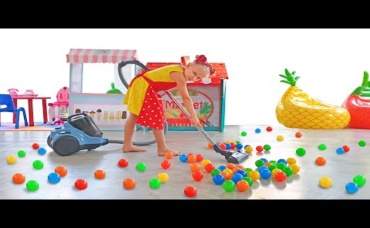 Alisa is learning to clean her room and toys